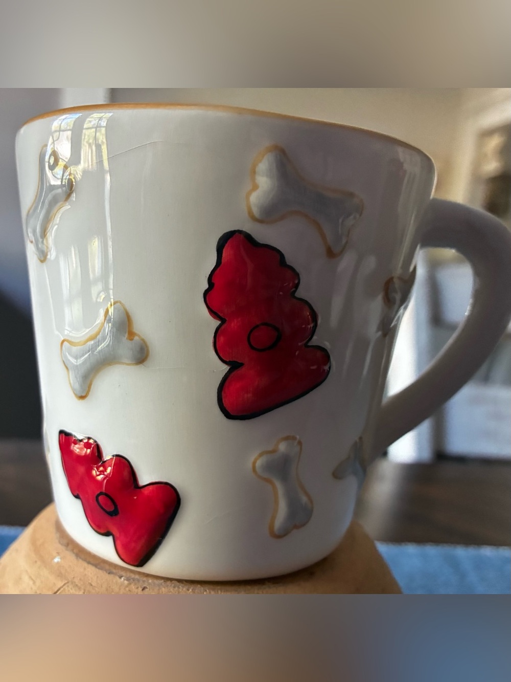 Hand-Painted White Ceramic Mug with Red Bone Accents At Home 1998 design